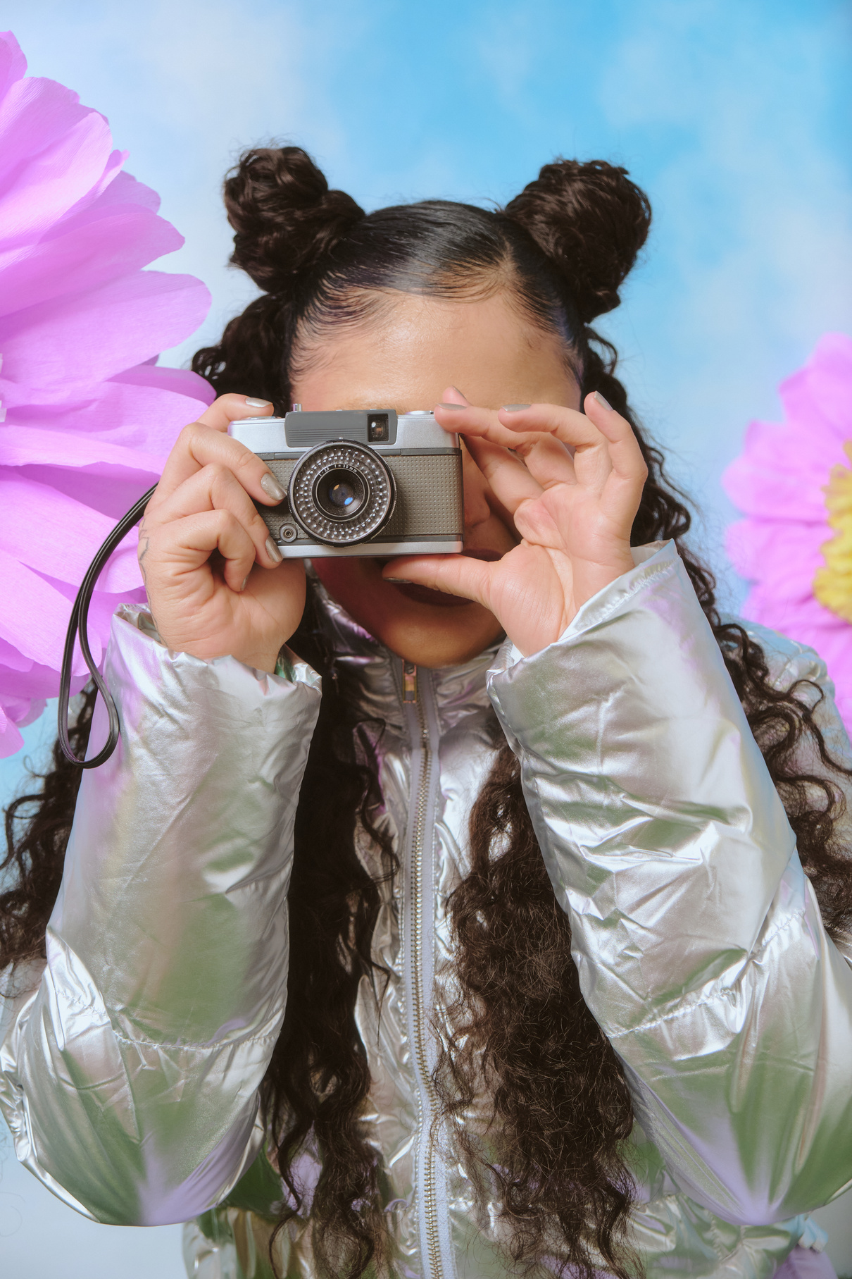 Portrait of a Woman Taking Picture with Vintage Camera